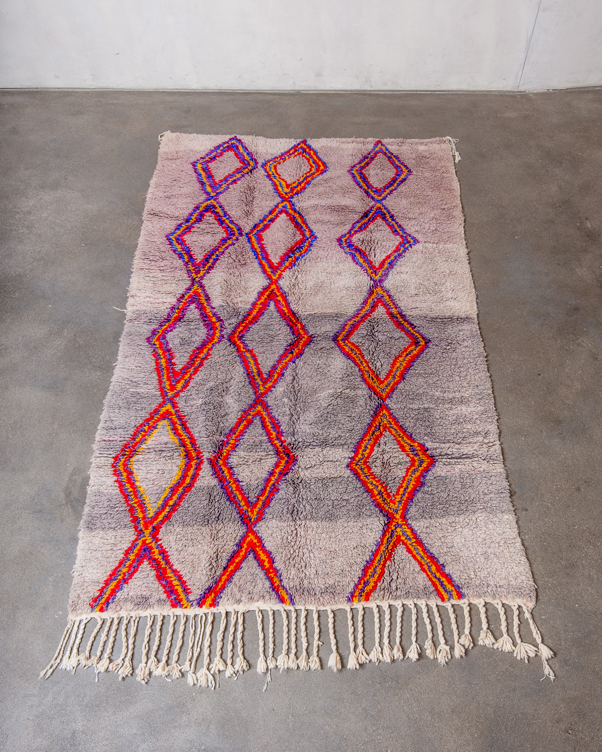 Modern, designer, handcrafted Berber rug from Morocco. Vintage carpet with beautiful colours and patterns and fluffy texture.